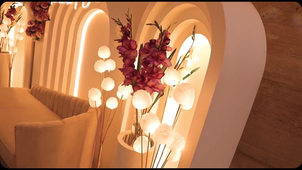 Engagement film of the lit arches and tables
