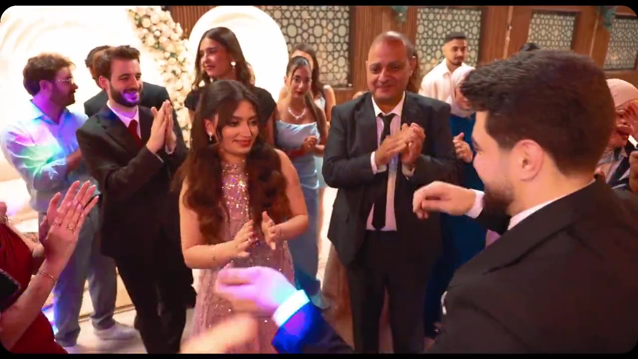 Wedding celebration with guests dancing