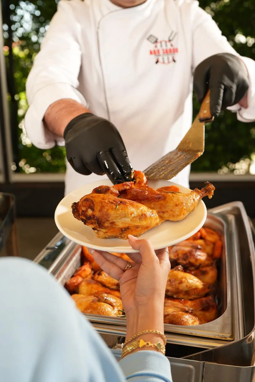 Roast chicken served to a guest