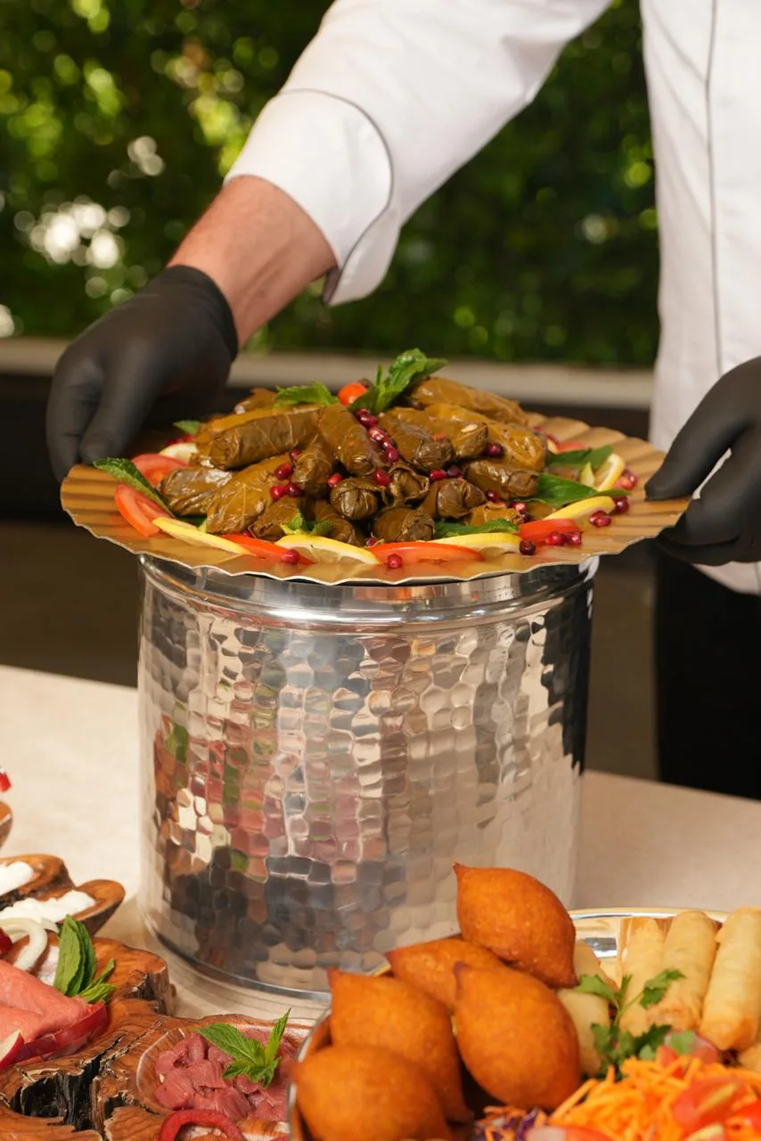 Stuffed vine leaves and kibbeh display